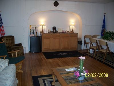 A living room with a coffee table and chairs on february 2 2008