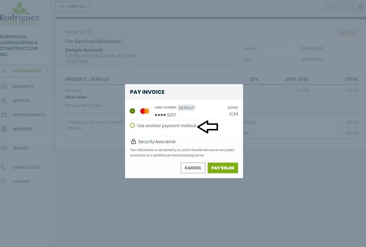 Website page dimmed by a centered white confirmation pop-up with a green action button and an arrow pointing to it