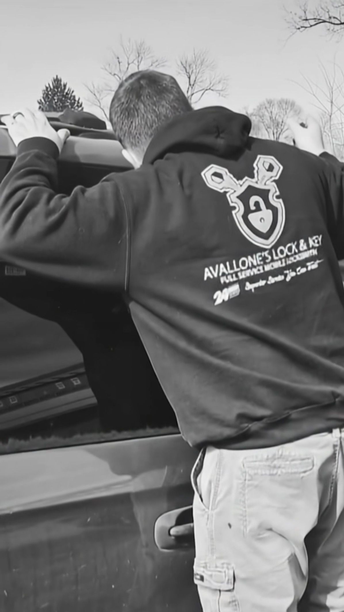 A close up of a door handle on a blue car