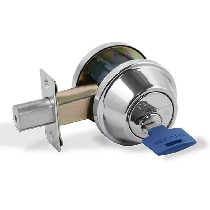 A person is fixing a door lock with a screwdriver.