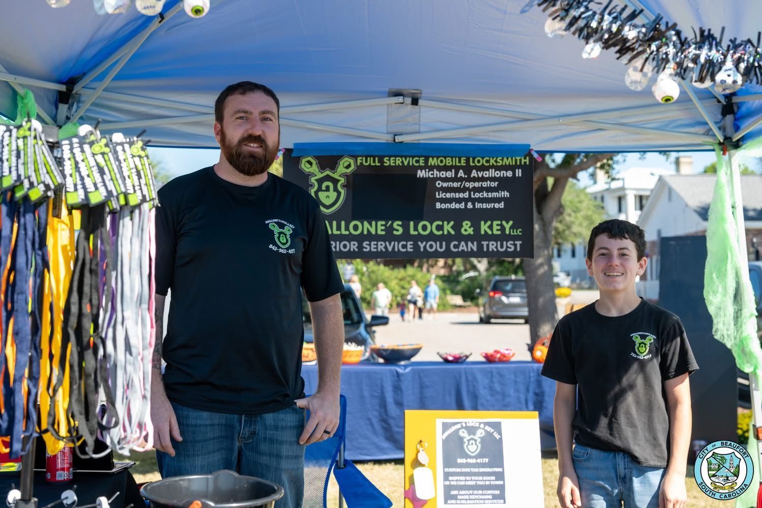 A man with a beard is standing at a counter in a store
