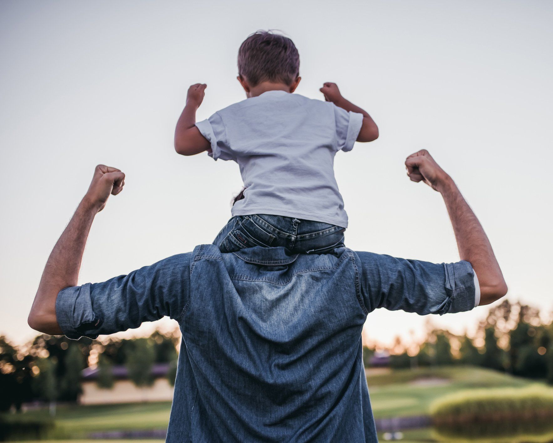 Father and Son Having Fun — Camden, NSW — Vicki Patterson Chiropractic