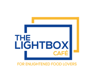 The logo for the lightbox cafe for enlightened food lovers.