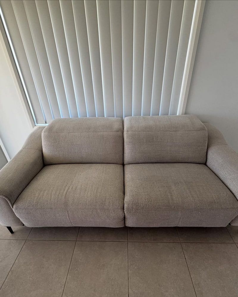 A Two-seater, Light-beige Fabric Sofa Positioned Against a Wall — Cobra's Carpet Cleaning in Junee, NSW