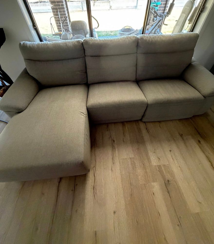 A Light Grey, Three-seat Sectional Sofa With a Left-side Chaise — Cobra's Carpet Cleaning in Junee, NSW