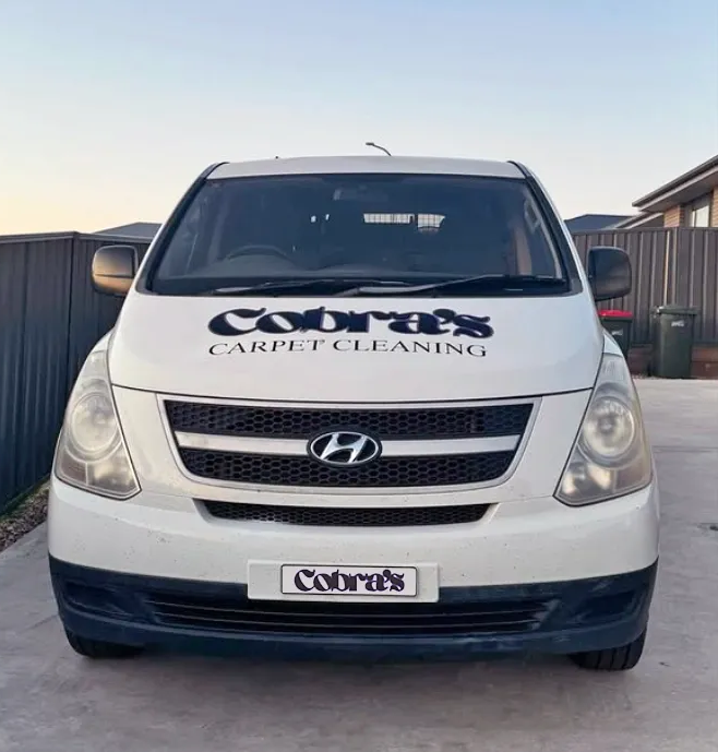 A White Van With Cobra's Carpet Cleaning Signage — Cobra's Carpet Cleaning in Junee, NSW