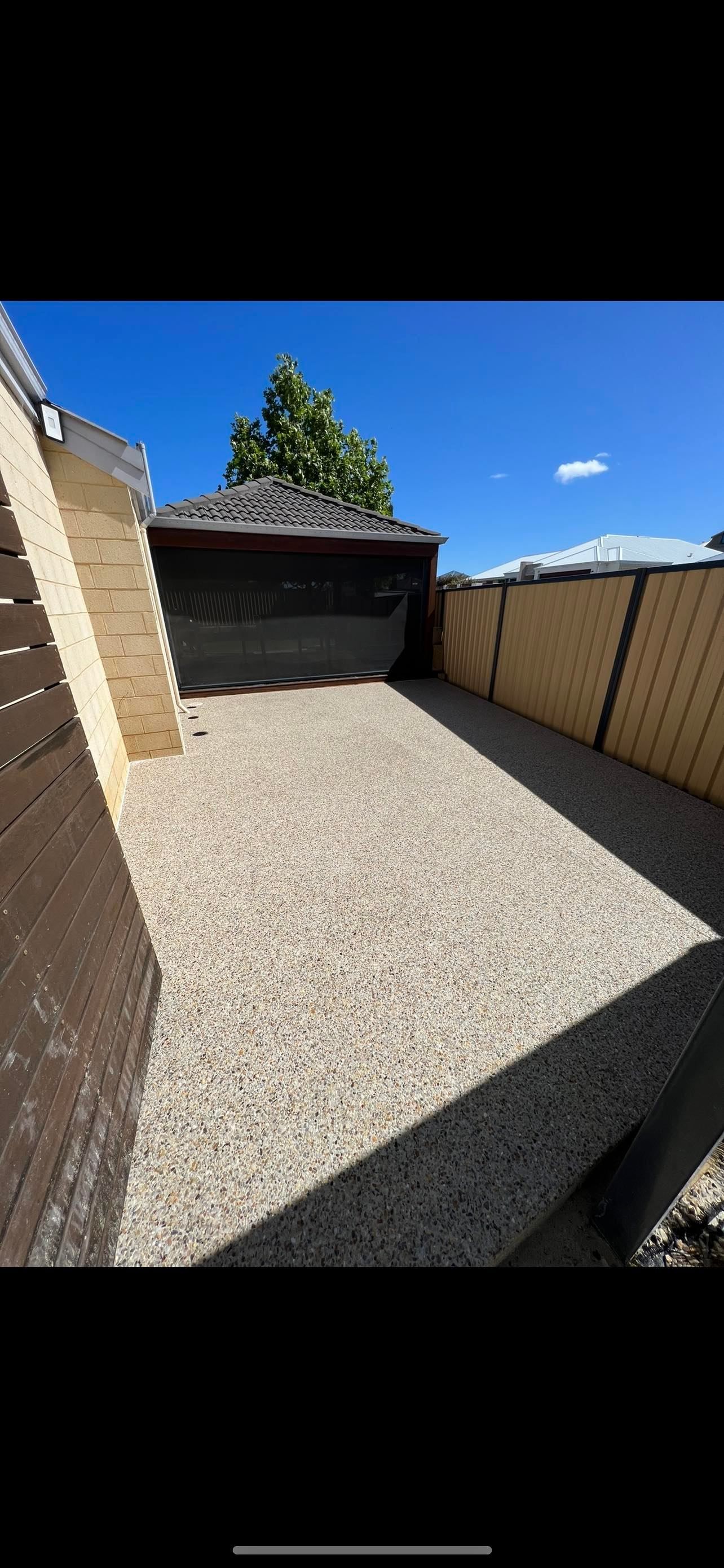 Exposed aggregate poured and washed off in court yard of southern suburbs property