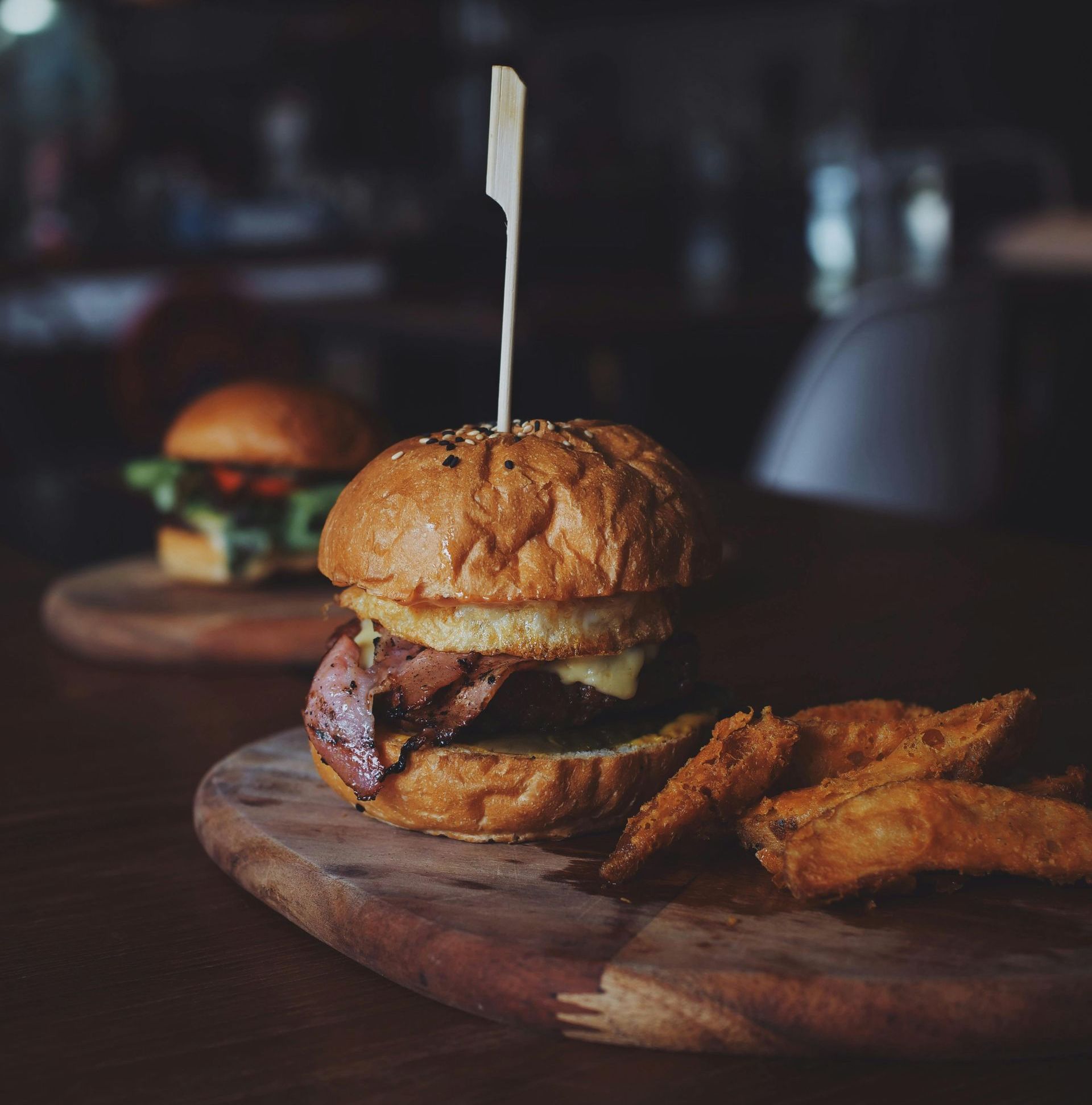 a burger and fries on a plate