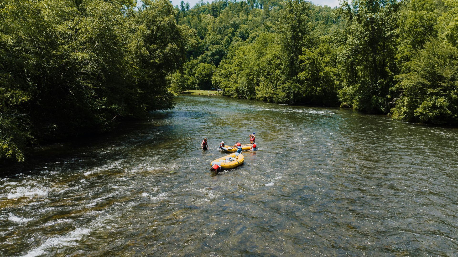 a beautiful river with trees in the distance