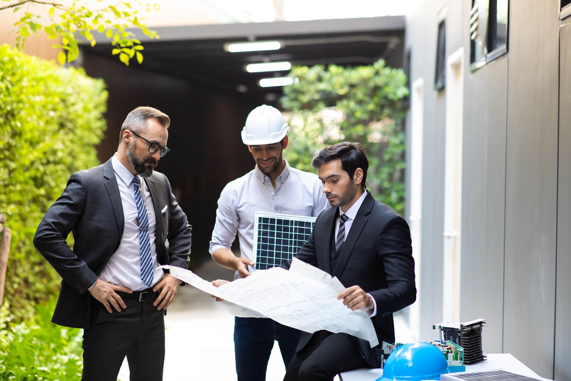 Energy engineer plan a project to build a solar panel for the building under construction.