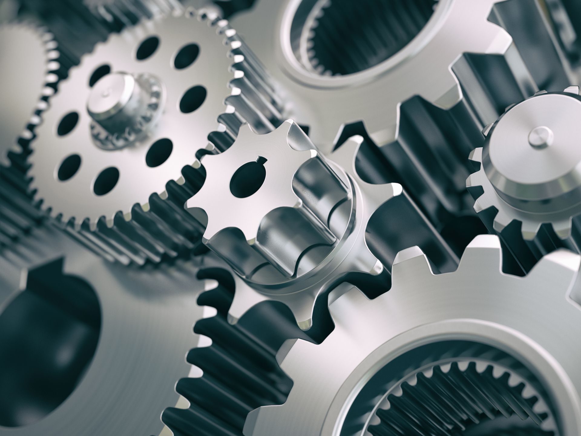 Detailed view of gears and pinions showing precision in industrial gear manufacturing process.