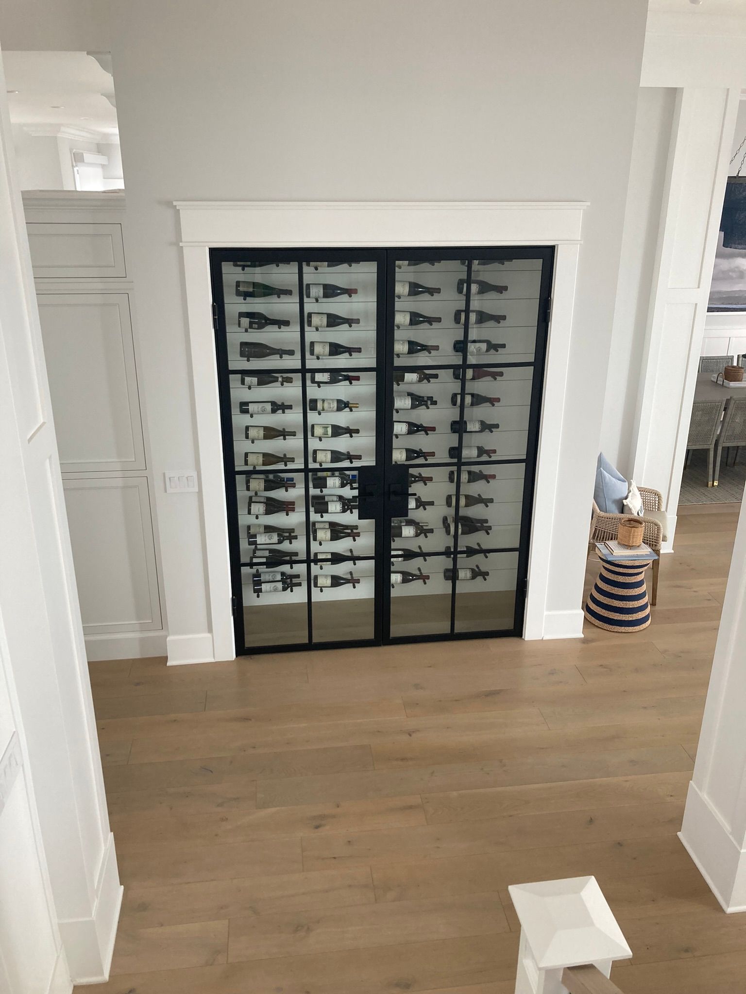 There is a wine cellar in the corner of the room.