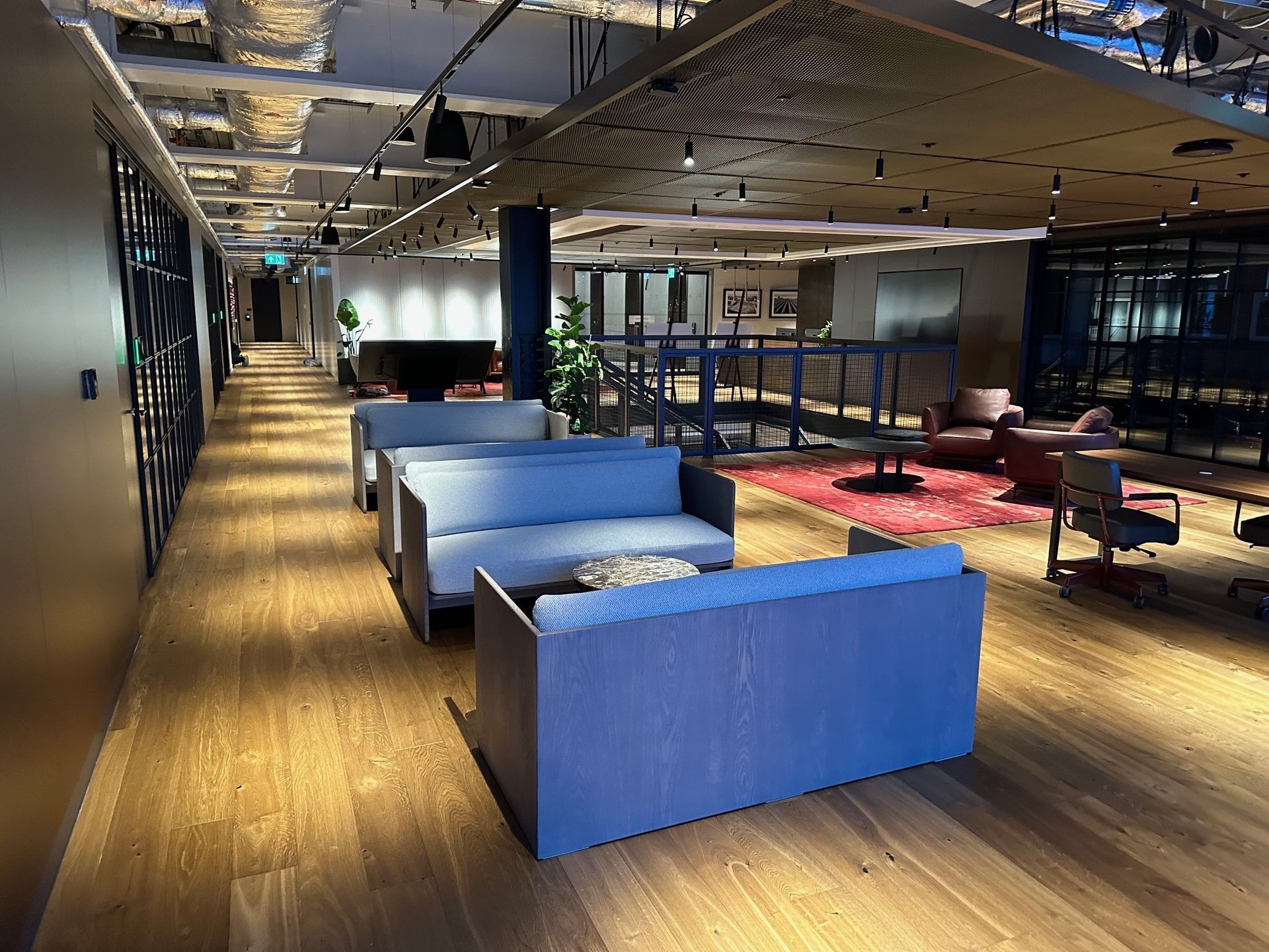 A long hallway with a lot of furniture in it