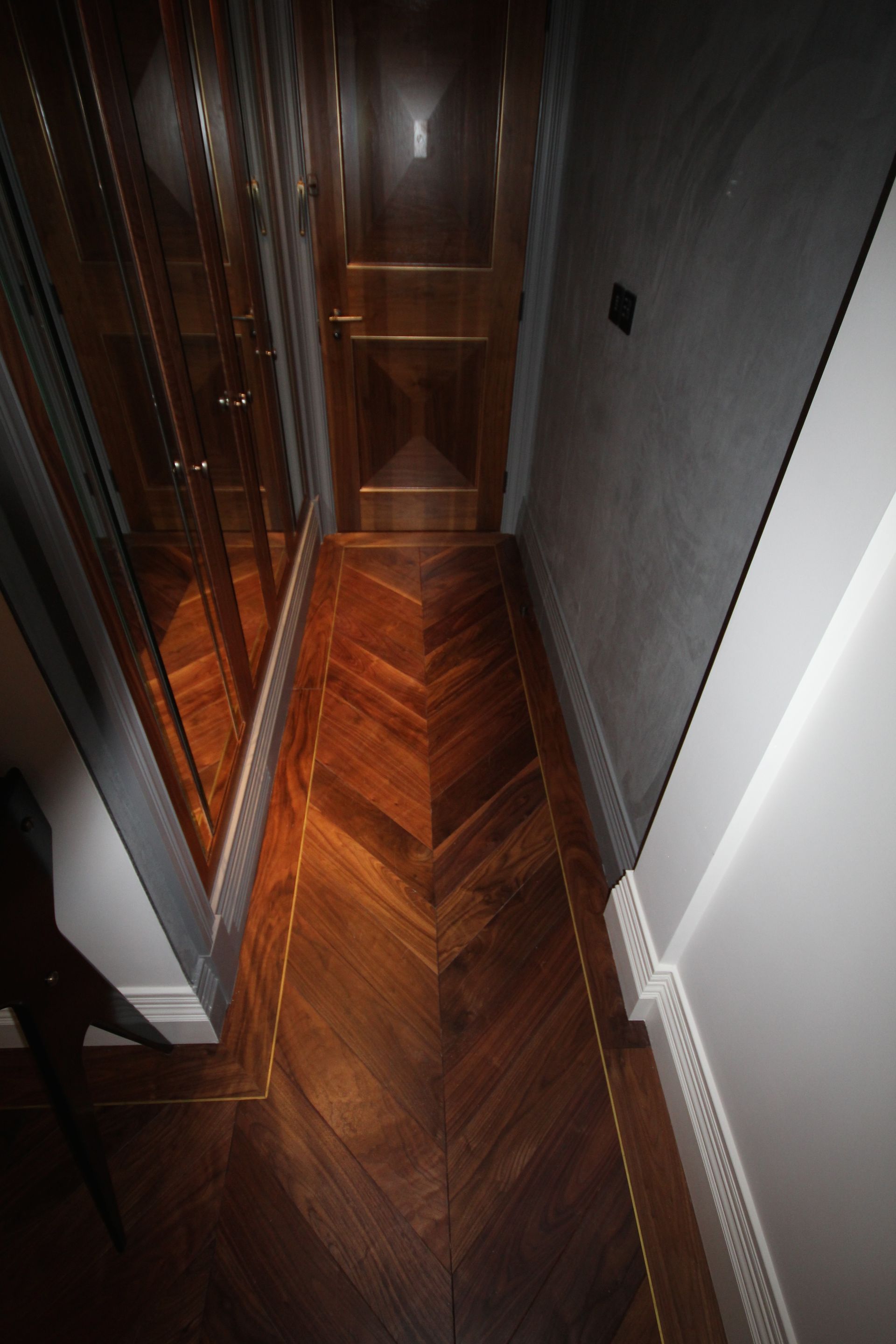 Prime grade walnut hallway at The Arts Club in Mayfair