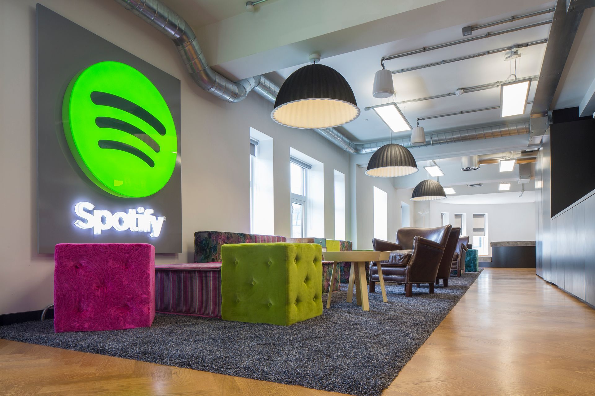 Spotify waiting room fitted with a Coloured Stain and Clear Oiled Flooring