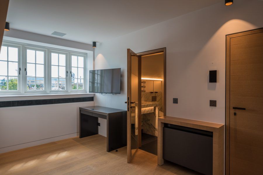 Small room in Kensington Private Residence fitted with Bespoke Oil flooring