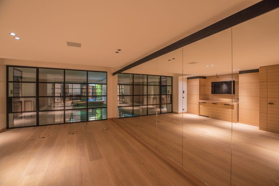 Large master bedroom at Private Residence in Kensington finished with Bespoke Oil flooring