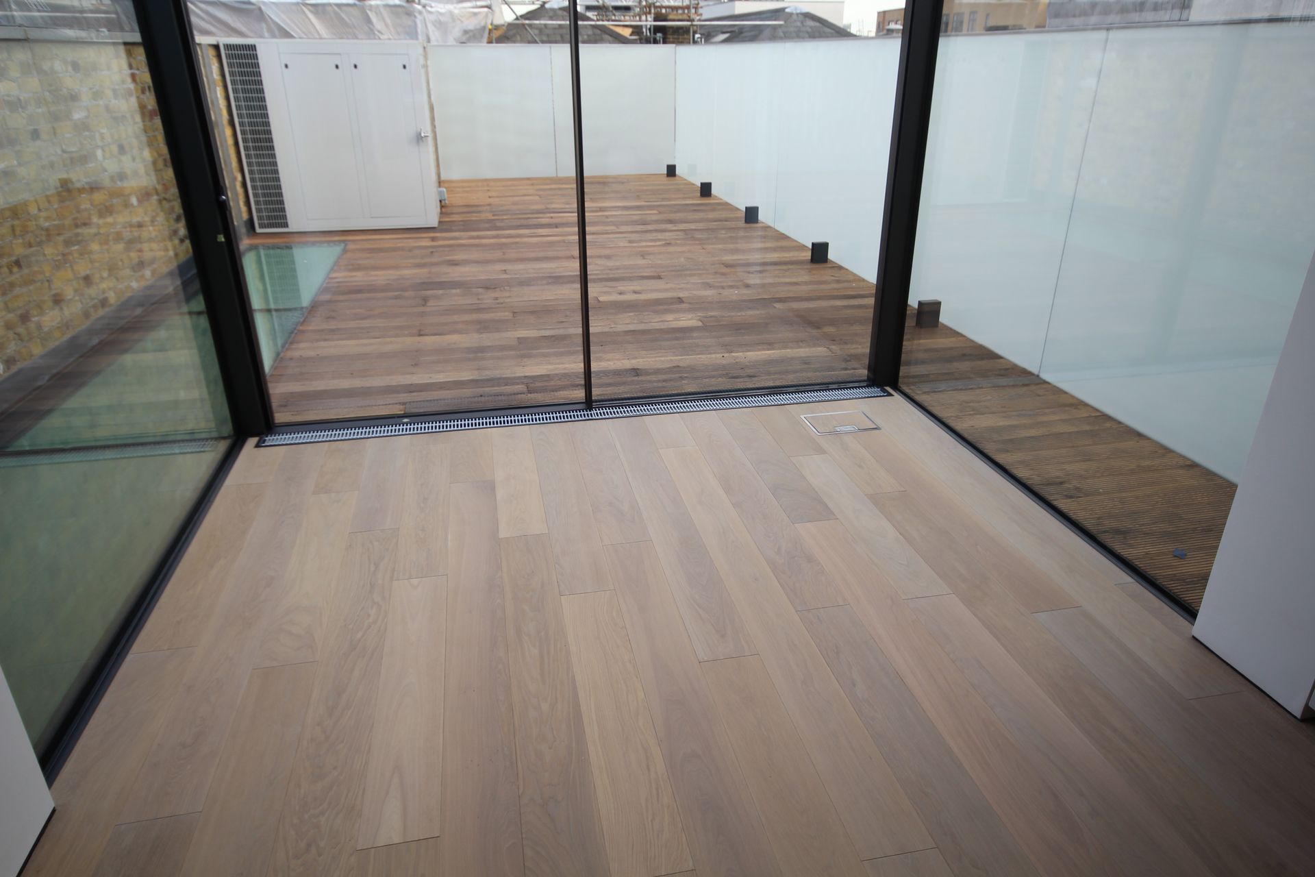 Flooring with Prime Grade Oak with Light White Oil at Residence in Charlotte Street, London
