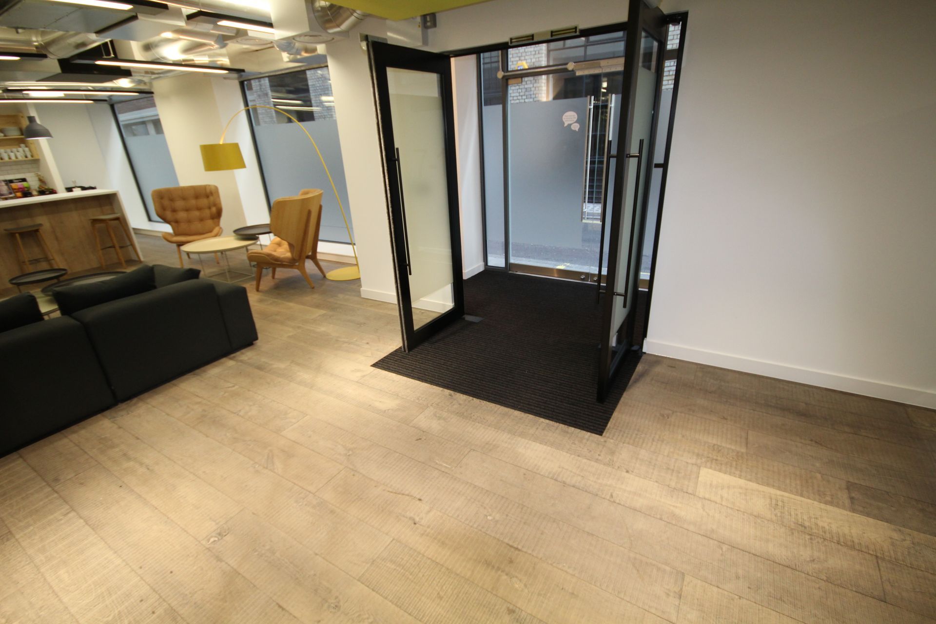 Entrance of Snapchat London fitted with a Smoked Oak Finish flooring