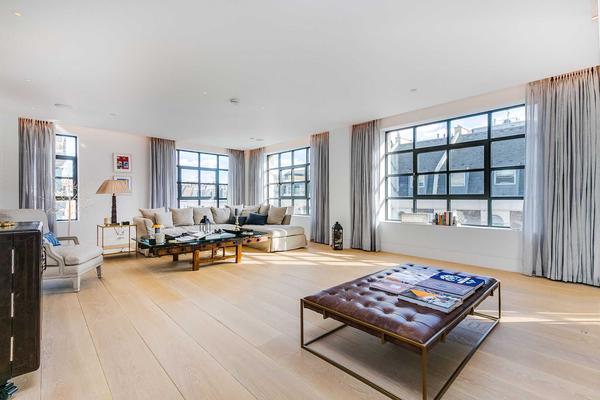 Brushed and Bespoke Coloured Oil flooring in lounge at Westbourne Lofts apartment