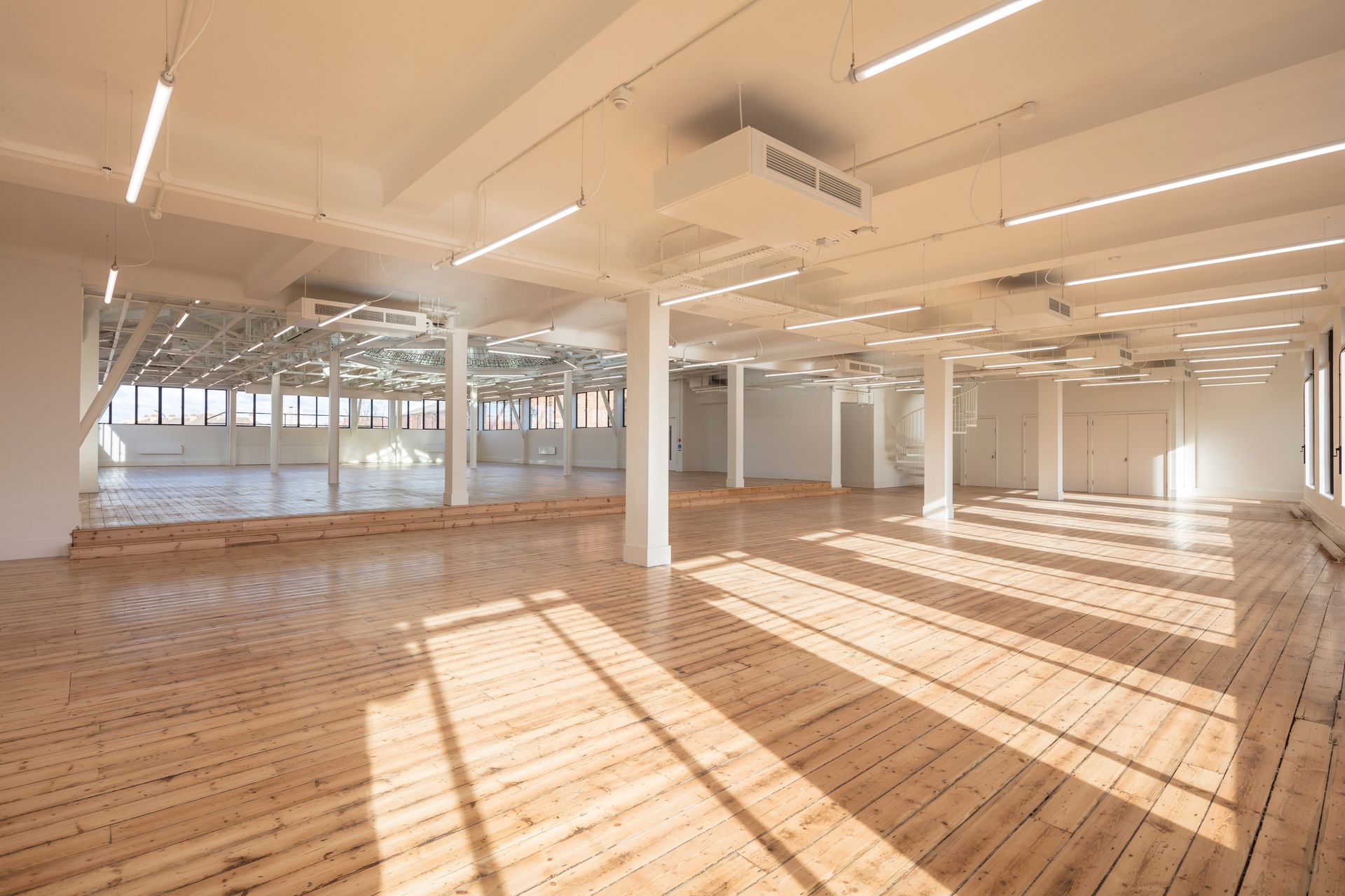 Large open plan empty room finished with a Clear Polyurethane Lacquer floor at Department W
