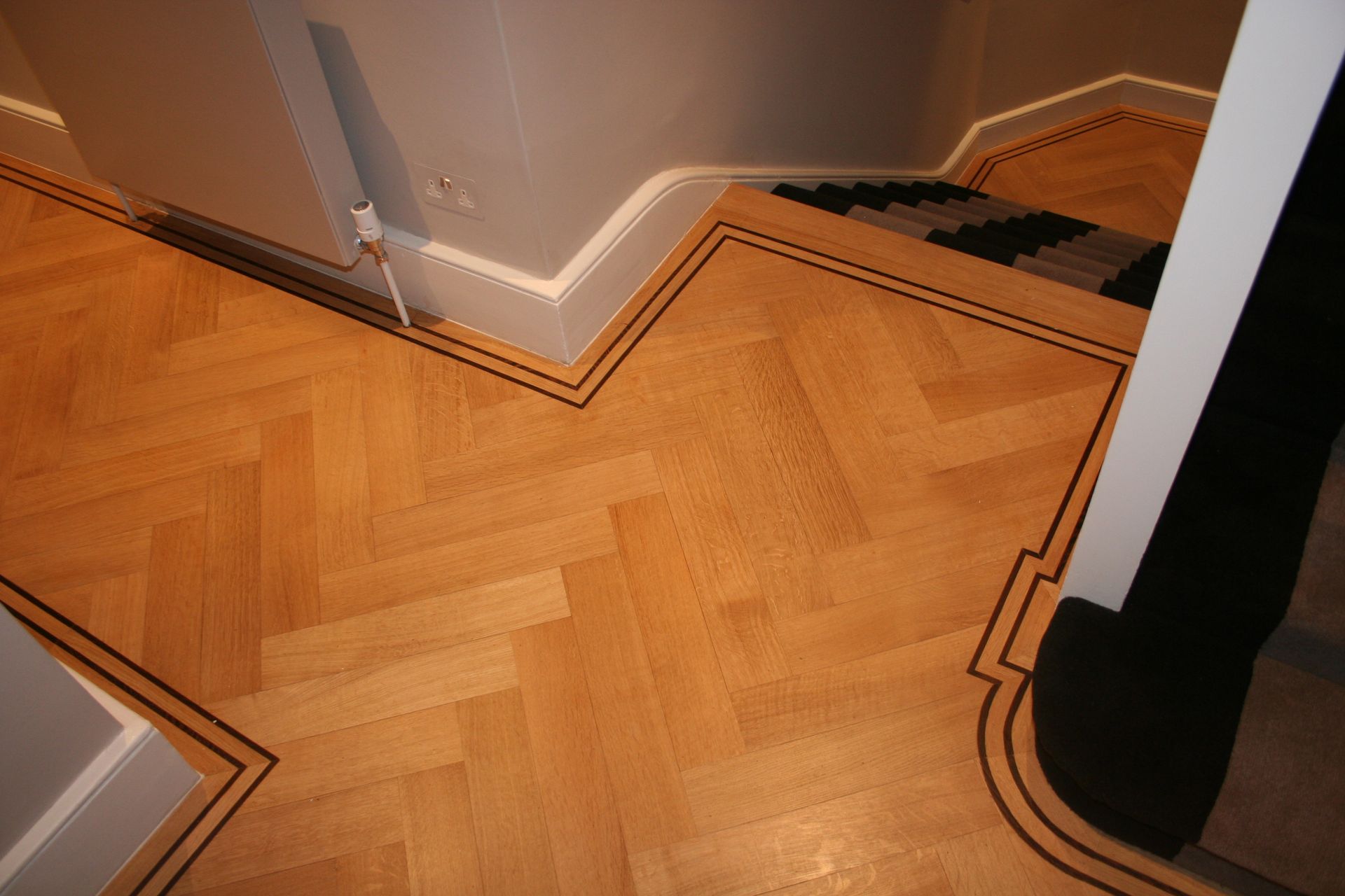 Prime Grade Oak Herringbone decking fitted at residence in Kings Road