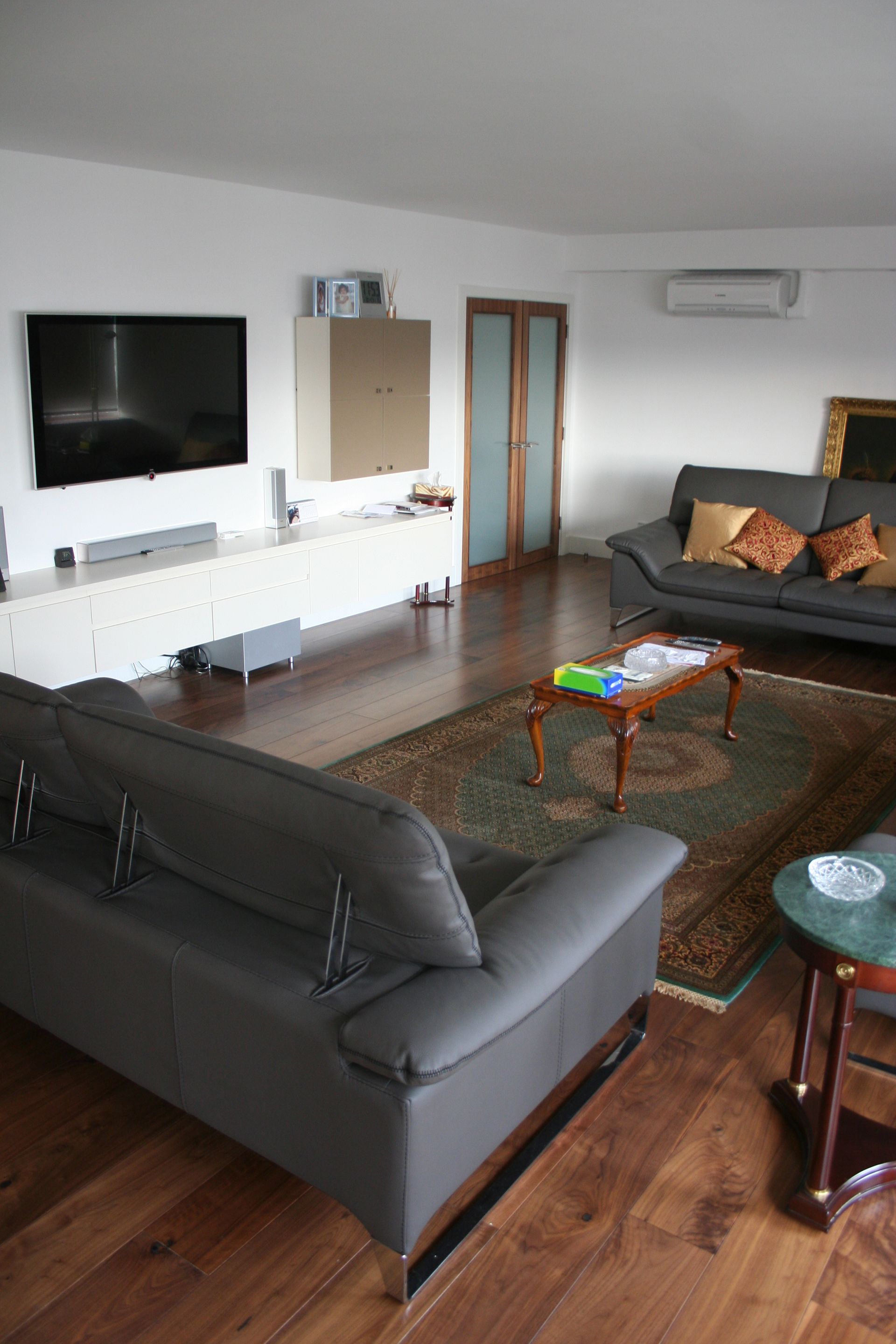 Lounge at Bayswater fitted with Multi Layered Prefinished Lacquered Walnut