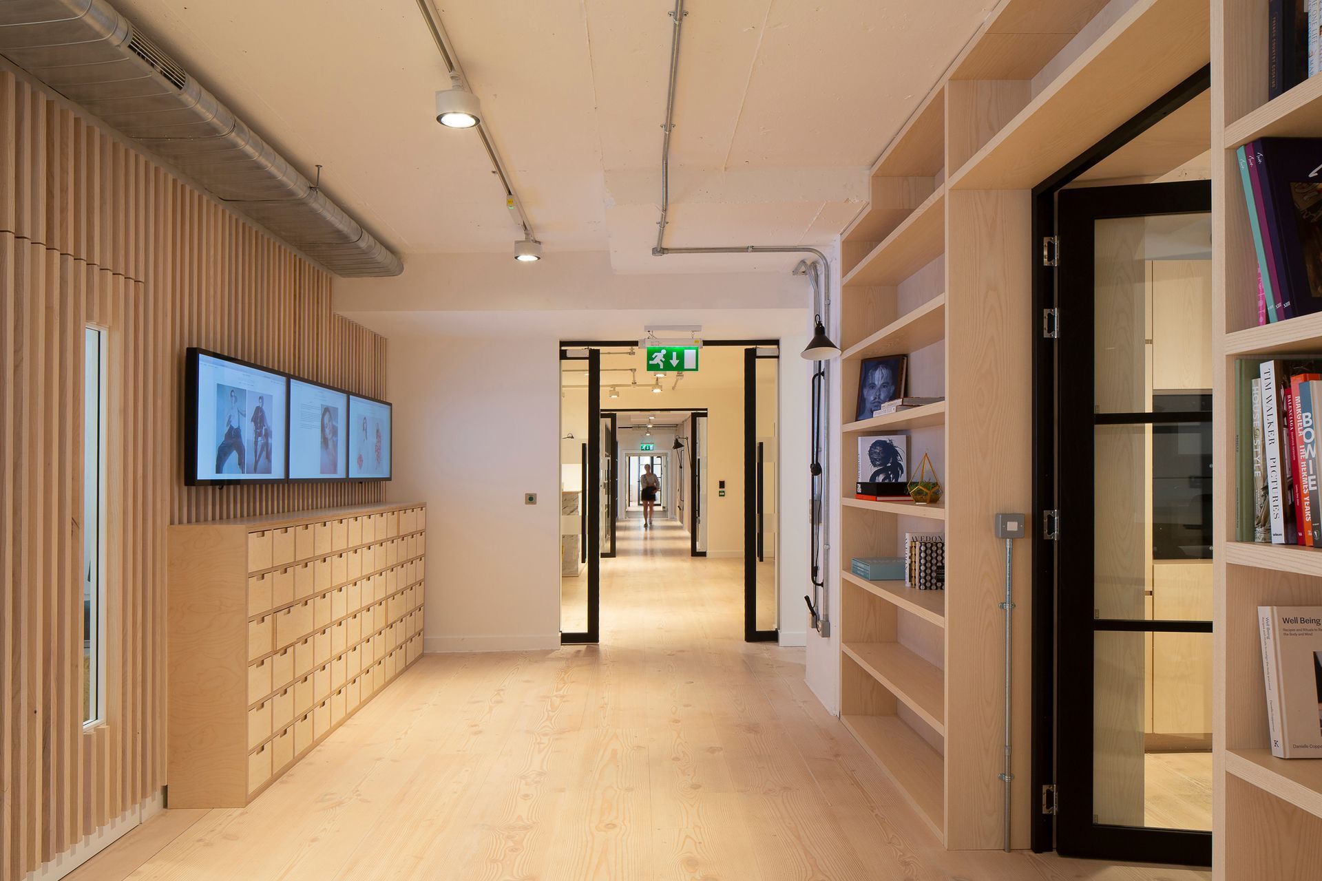 Hallway at IMG Models fitted with a Coloured Stain & Clear Oiled flooring