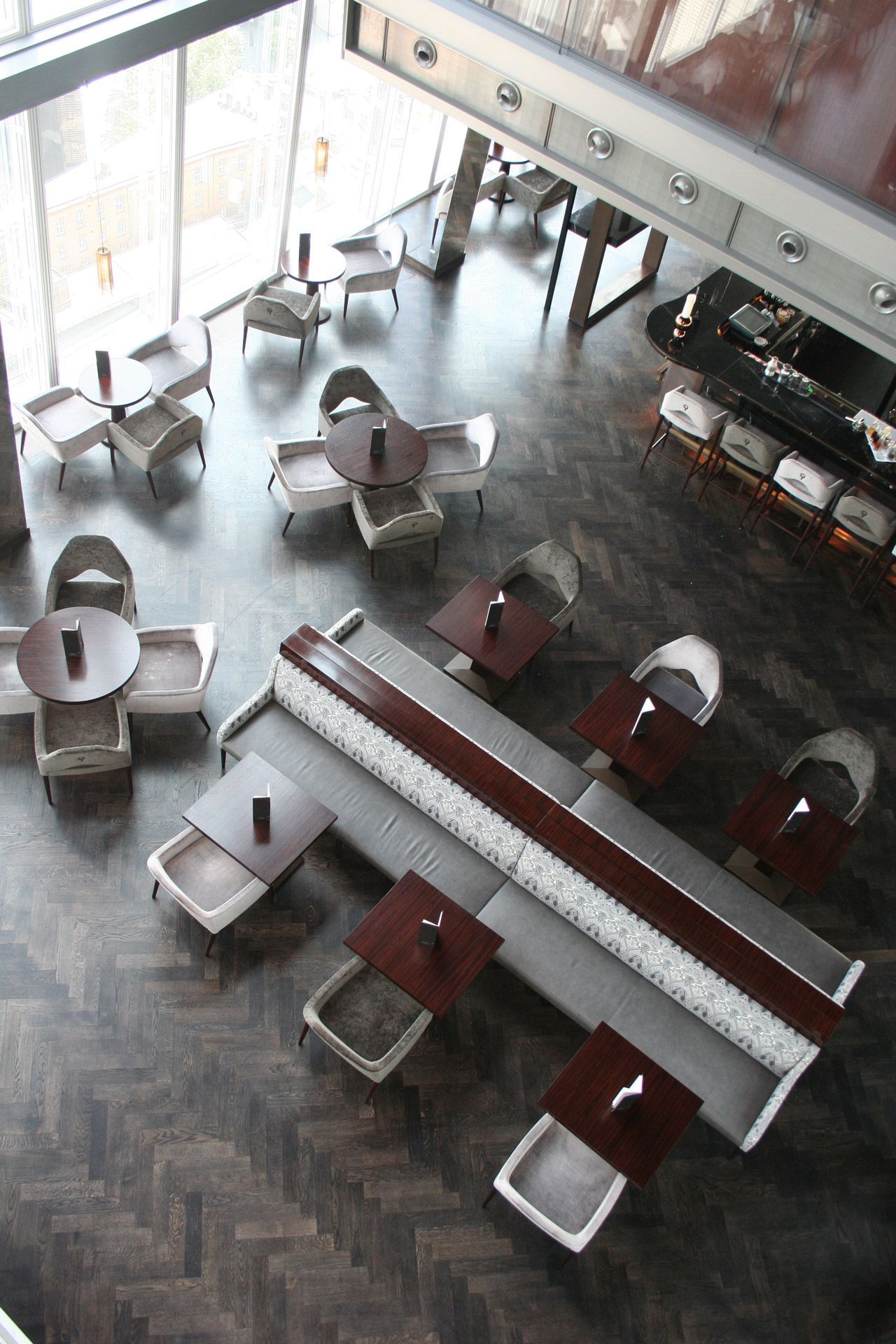 Tables and chairs at The Shard, London fitted with Thermo Oak Blocks underneath