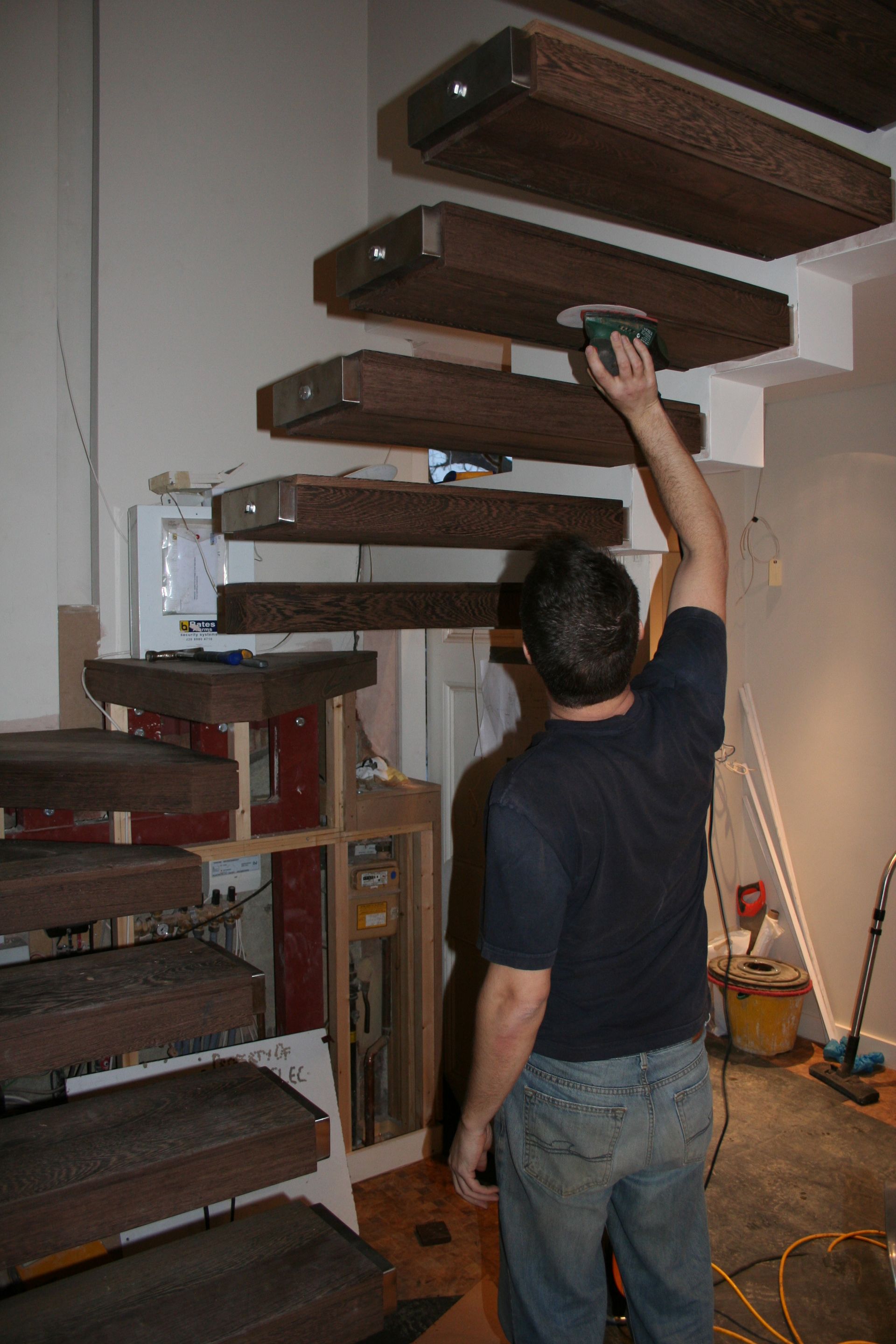 Wenge Cladded Steel Staircase installed by Dyfed Richards