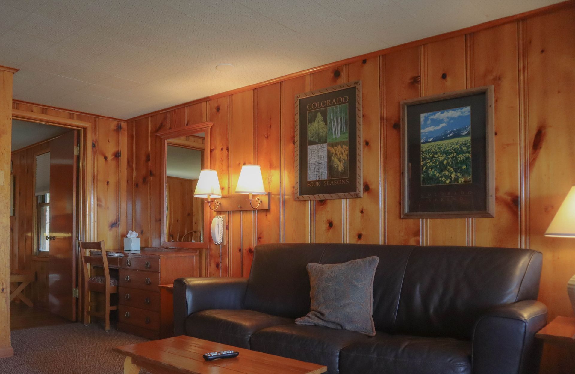 A living room with a couch and a coffee table