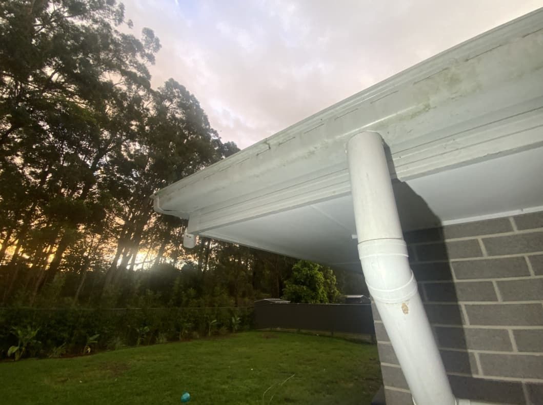 A White Gutter On The Side Of A House — Able Building And Pest Inspections In Nambucca Heads, NSW