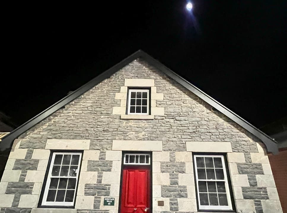 A Person Is Taking A Picture Of A Ceiling With A Cell Phone — Able Building And Pest Inspections In Coffs Harbour, NSW