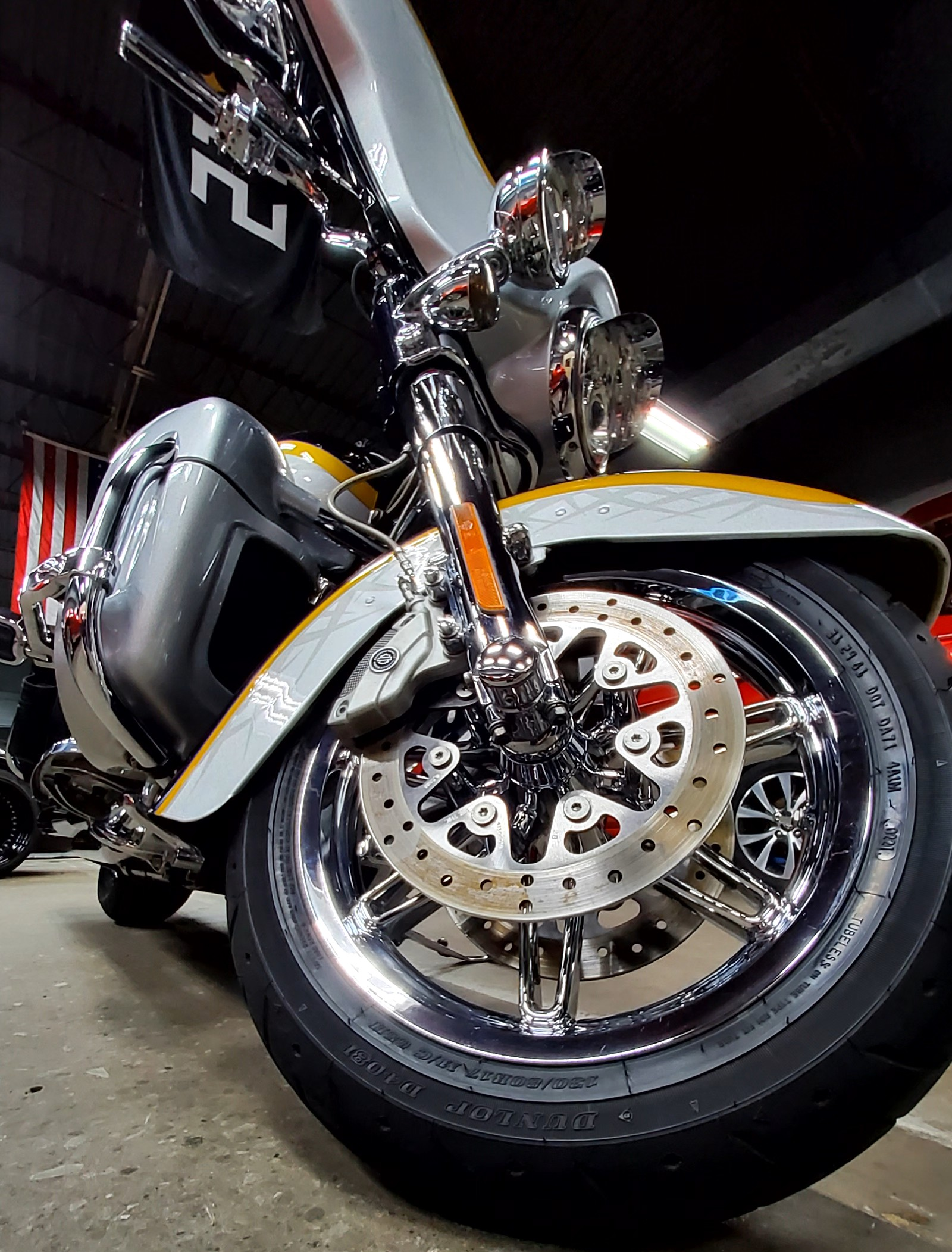 A close up of the front wheel of a motorcycle