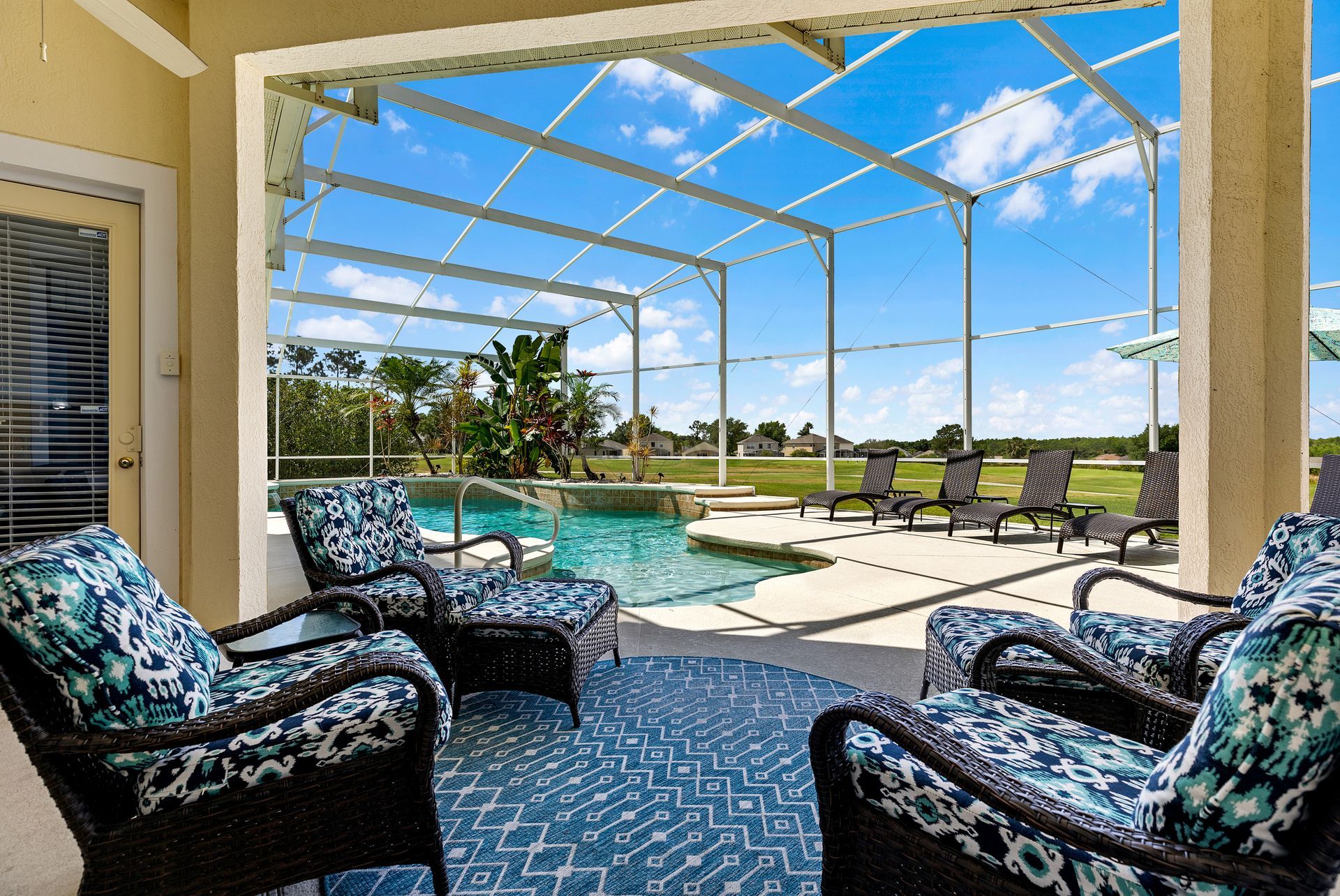 Fairwayview Villa pool with golf course view.