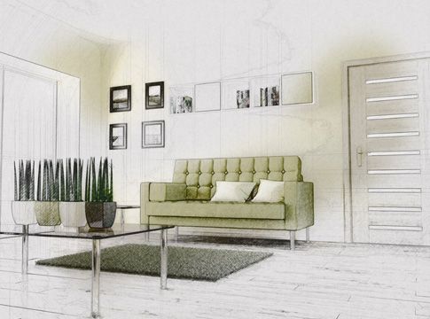 Green sofa and decorative plants in a bright living room, framed art on the wall, door to the right.