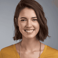 woman with short hair smiling
