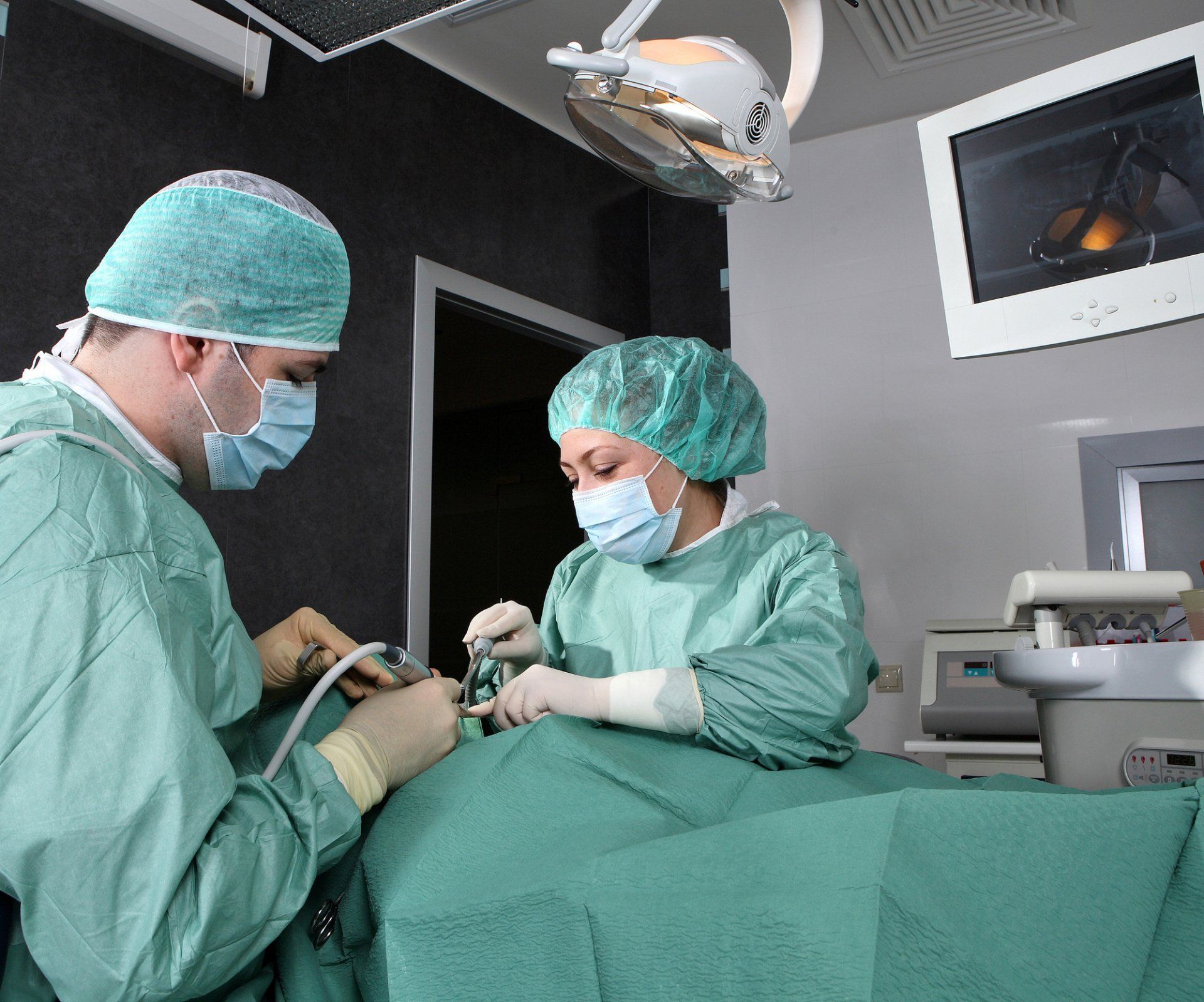 dentist at work in dental room