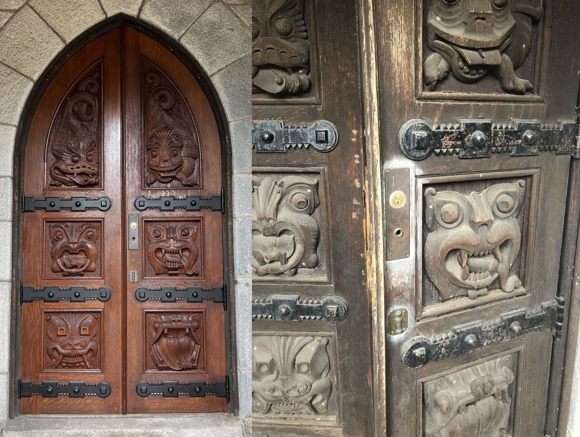 Arched double wooden door featuring panels with intricate, carved demonic faces and black metal hardware.