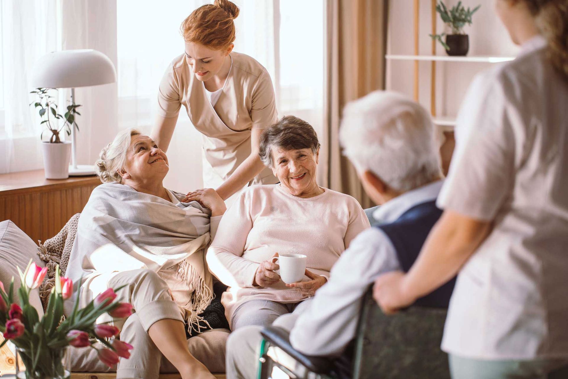 Group of elderly people with nurses