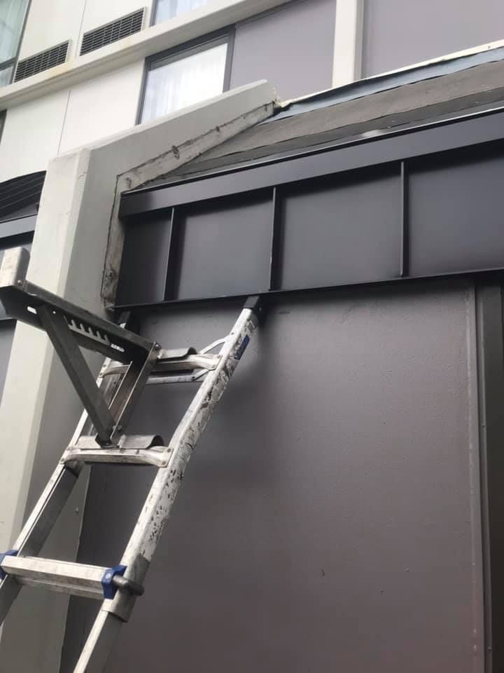 A Ladder Attached to the Side of a Building - Whitehall, PA - Jimenez Contracting LLC