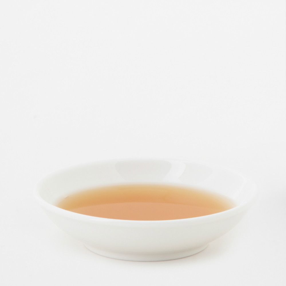 一瓶梅子醋，附禮盒，標示為日文。