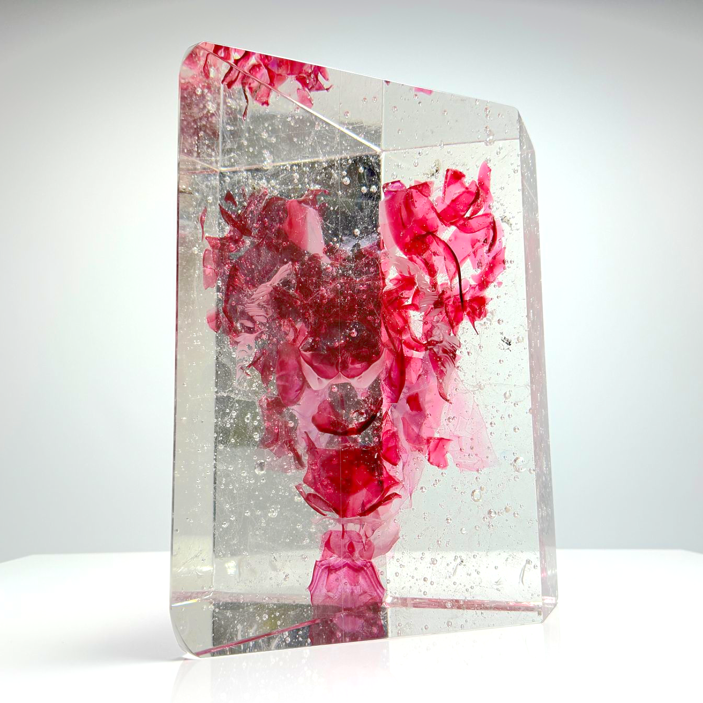 A piece of glass with a heart in it.