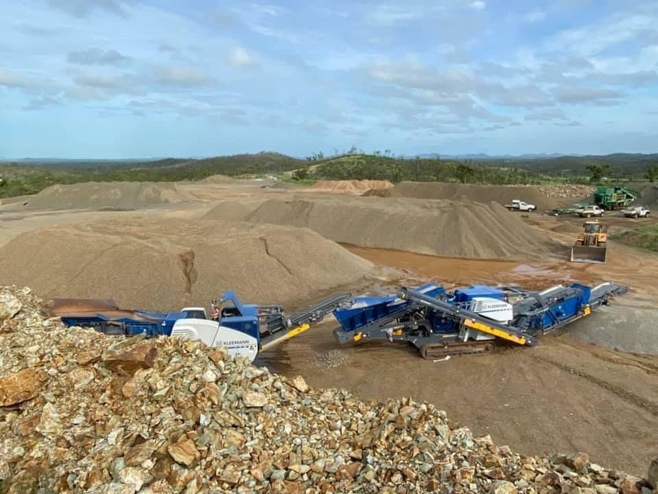 Picture of Workers Standing with Bulldozer — The Caves Quarry  in The Caves, QLD