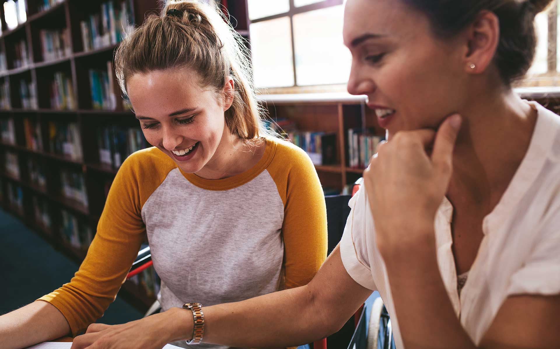 student studying with her tutor 