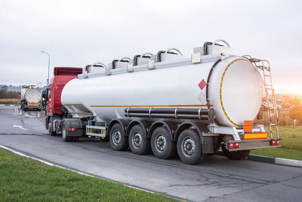 Tanker Truck Transporting Liquid Fuel on A Road During Daytime — Haigh Truck & 4WD Repairs In Orange, NSW