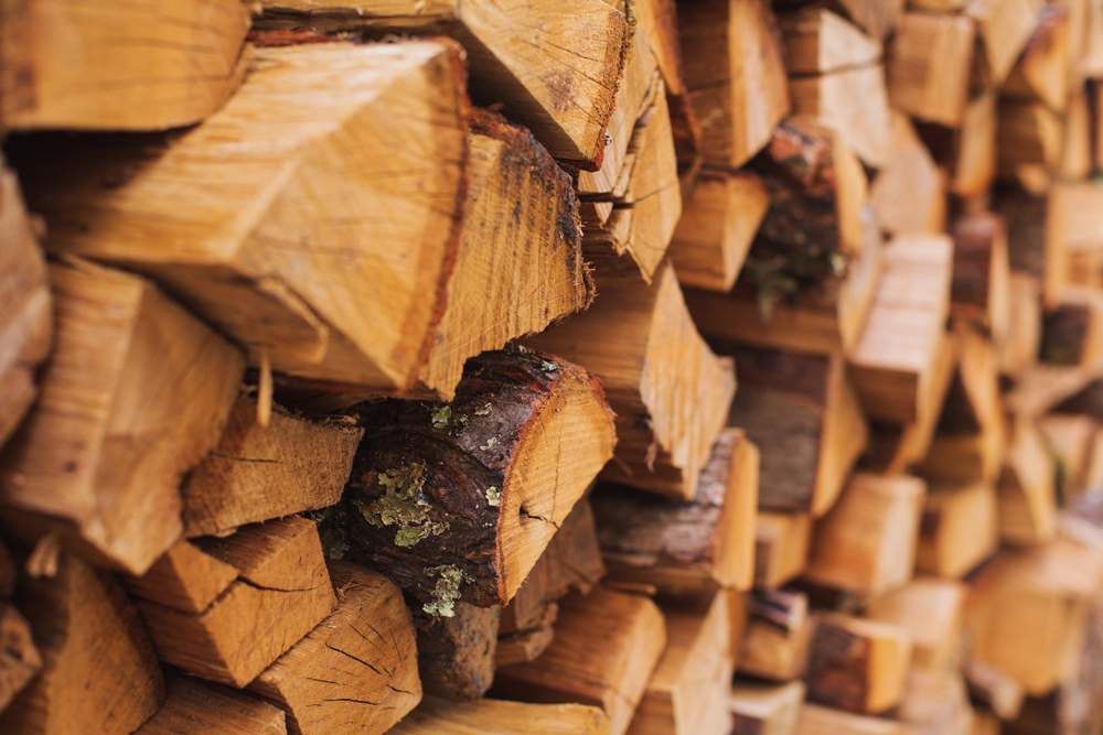 Stack of Cut Firewood, Showing Wood Grain, Light Brown Color — The Soil Yard in Delacombe, VIC