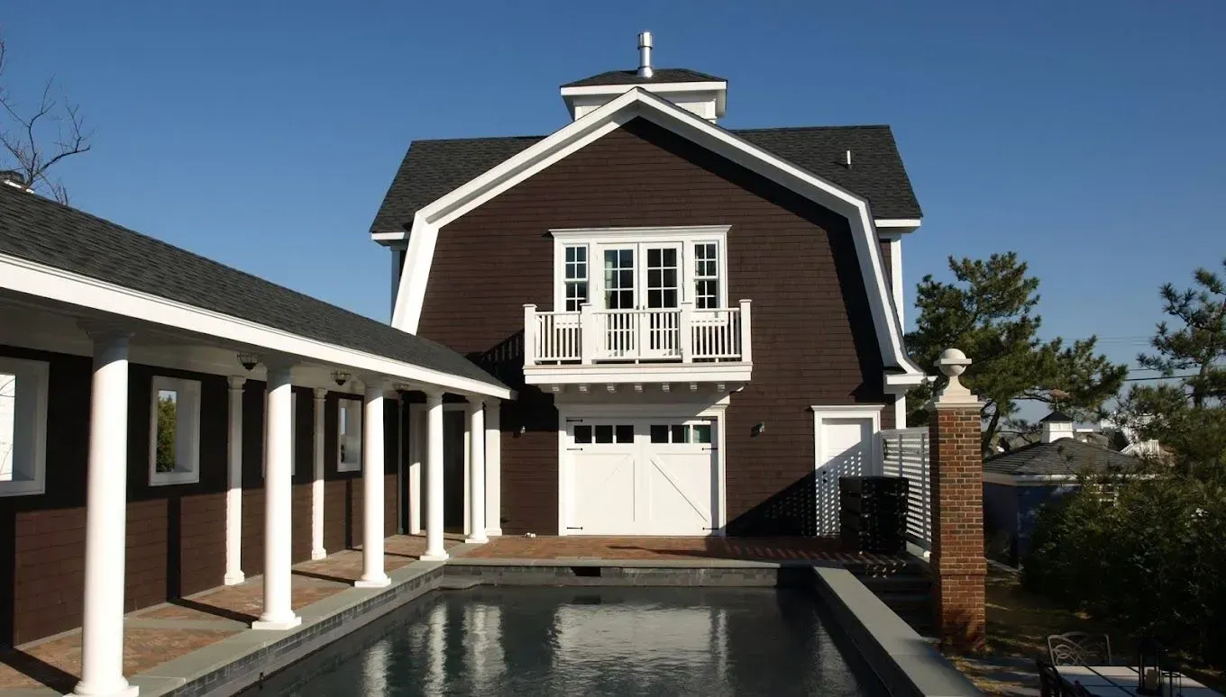 A bathroom with a sink a mirror and a toilet