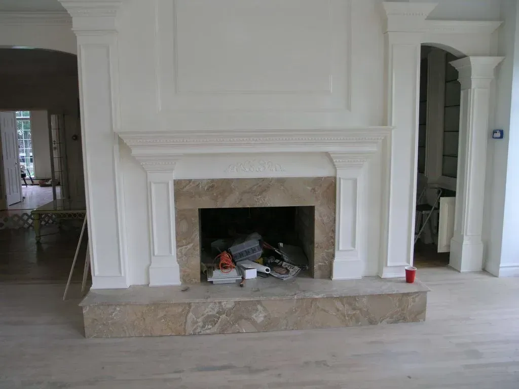 A bathroom with a sink a mirror and a toilet