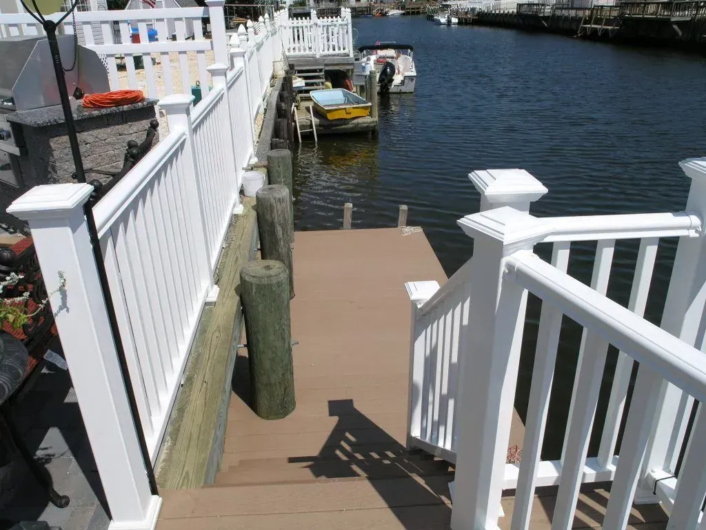 A bathroom with a sink a mirror and a toilet